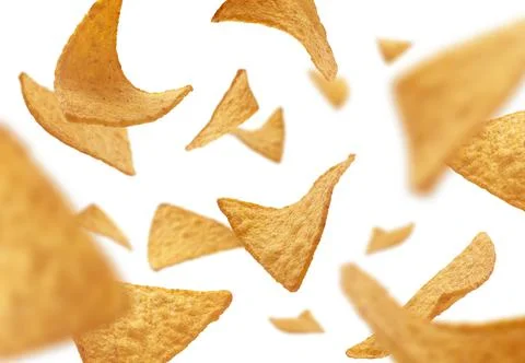 Corn chips of triangular shape levitate on a white background 스톡 사진