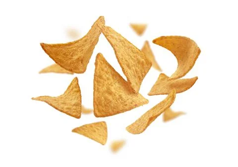 Corn chips of triangular shape levitate on a white background 스톡 사진