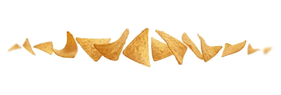 Corn chips of triangular shape levitate on a white background Corn chips o... Stock Photos