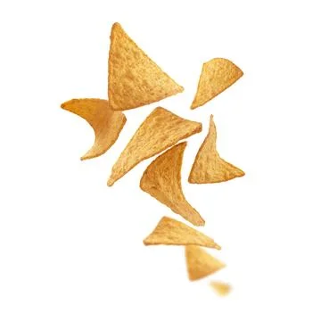 Corn chips of triangular shape levitate on a white background 스톡 사진