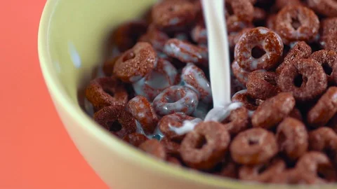 Corn chocolate rings with milk Stock Footage 98156296