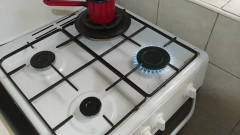 Corn on the cob boils on a stove Stock Footage 134344965