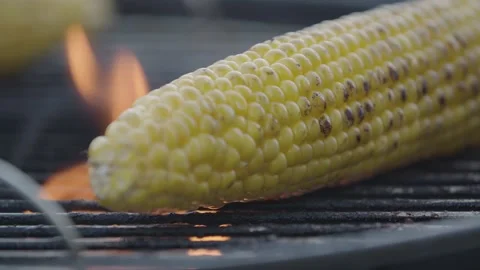 Corn Cob on grill with flames 스톡 동영상 142813718