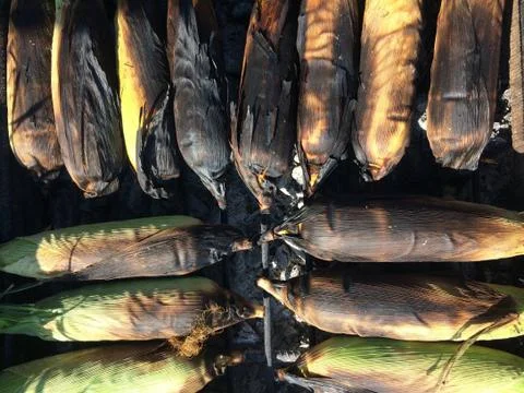 Corn on the Cob grilling on a Grill Foto stock