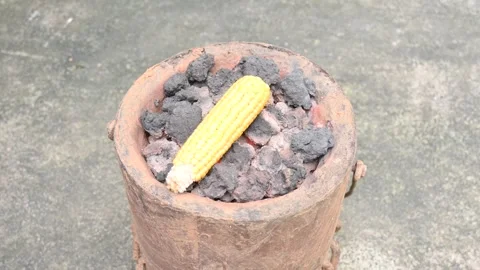 Corn cobs being grilled on a coal stove. Stock Footage 290311355