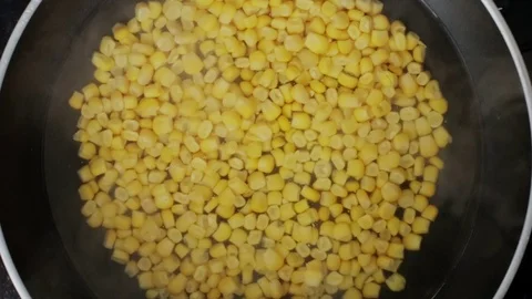 Corn is cooked in a pan Stock Footage 127204337