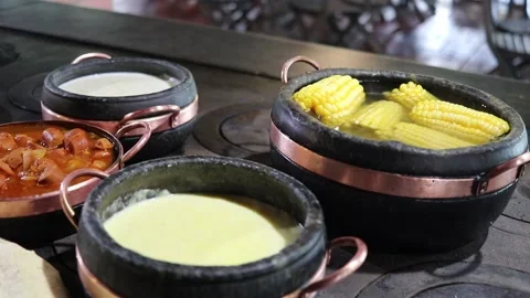 Corn Cooked in the Wood Stove Stock Footage 229733259