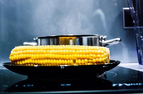 Corn, corn on the cob, stove, oven, pot, steam, smoke, cooking, chef, kitch.. Stock Photos
