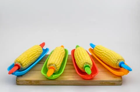 Corn in dish on board 01 Stock Photos