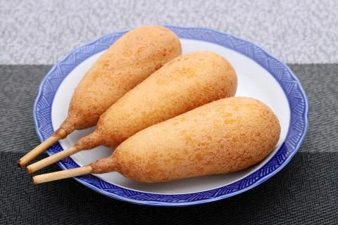 Corn dogs on a plate Stock Photos