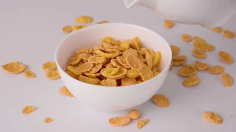 Corn flakes and milk for breakfast Stock Footage 222564457
