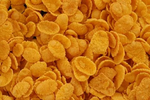 Corn flakes background and texture. Top view cornflake cereal for morning Stock Photos