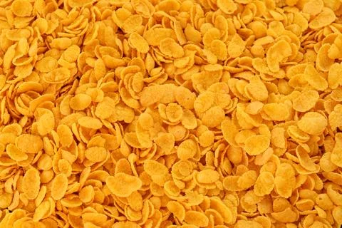 Corn flakes background and texture. Top view cornflake cereal for morning Stock Photos