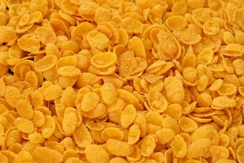 Corn flakes background and texture. Top view cornflake cereal box for breakfast Stock Photos