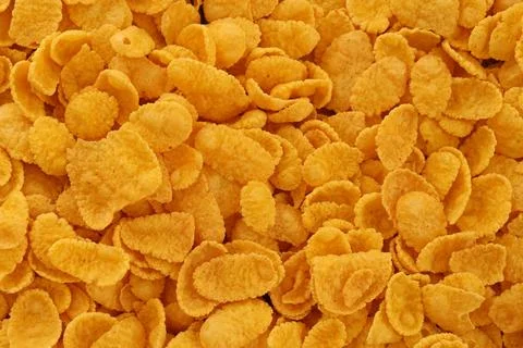 Corn flakes background and texture. Top view cornflake cereal for morning Stock Photos