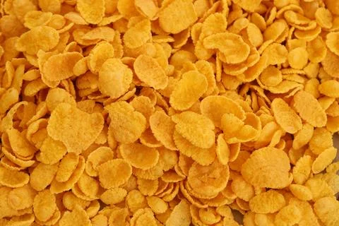 Corn flakes background. Top view cornflake cereal box for morning breakfast Stock Photos