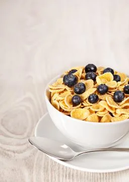 Corn flakes with blueberries breakfast Stock Photos