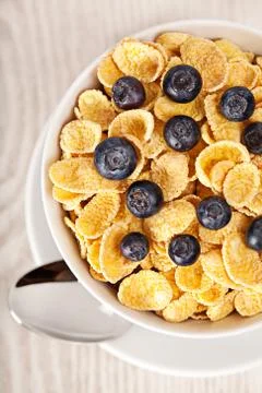 Corn flakes with blueberries breakfast Stock Photos