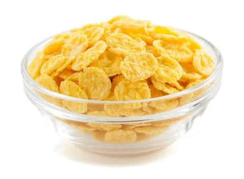 Corn flakes in bowl on white Stock Photos