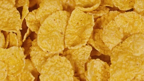 Corn flakes breakfast scene in 4k (UHD) Stock Footage 142062375