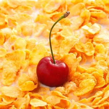 Corn flakes with cherry Stock Photos