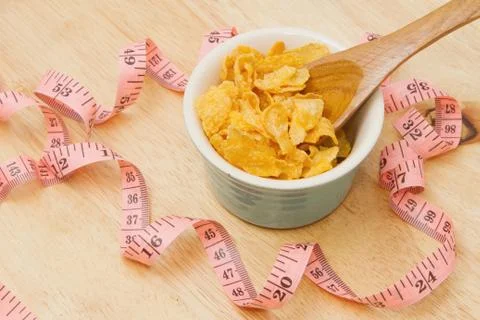 Corn flakes in dish isolated Stock Photos