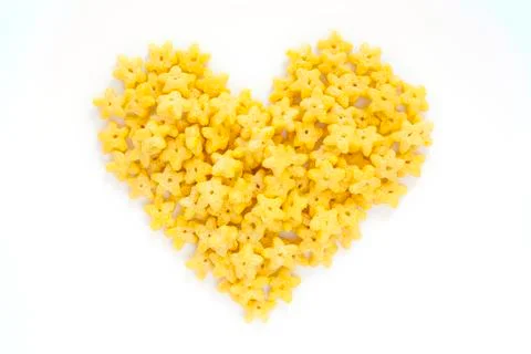 Corn Flakes in the form Heart Isolated Top View on White Background Foto stock