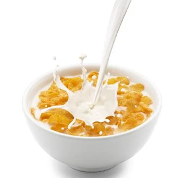 Corn flakes with milk splash Foto stock