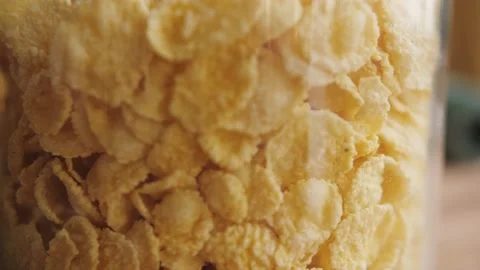 Corn flakes muesli texture close-up, oatmeal granola, cooking cereals for Stock Footage 186281224