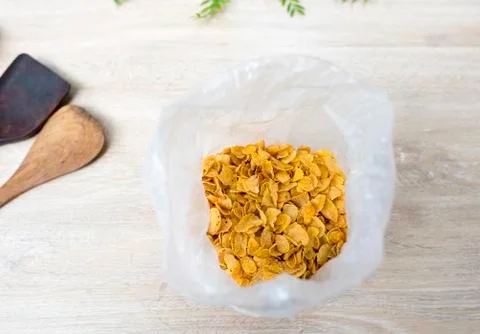 Corn flakes in plastic bag Stock Photos