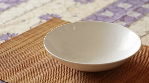 Corn flakes poured into bowl - close up Stock Footage 35912570