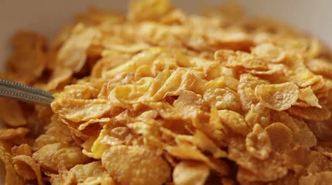 Corn flakes pouring - preparing breakfast Stock Footage 35912657