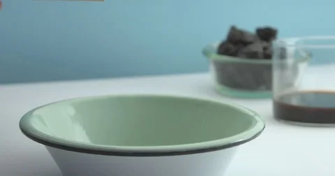 Corn flakes rings falling on a bowl slow motion. Breakfast theme footage Stock Footage 76996409