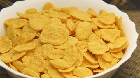 Corn-flakes rotating on table Stock Footage 59561801