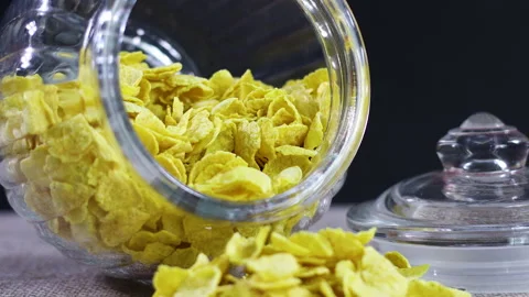 Corn flakes for snack or breakfast in glass jar on the table 動画素材 140230952