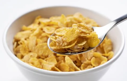 Corn flakes on the spoon Stock Photos
