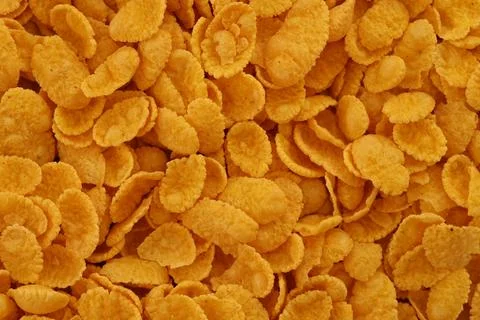 Corn flakes texture. Top view cornflake cereal box for morning breakfast Stock Photos