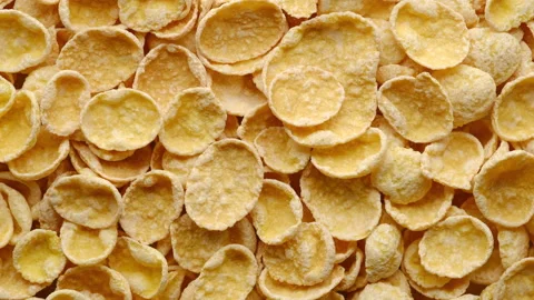 Corn flakes top view rotating. healthy food breakfast Stock Footage 132042298