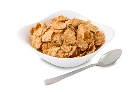Corn flakes in white plate isolated on white background Stock Photos