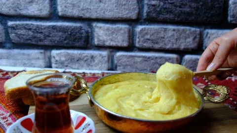Corn flour and cheese dishes, "muhlama or Kuymak" in Turkish cuisine Stock Footage 145120580
