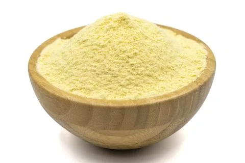 Corn flour isolated on white background. Cornmeal in wooden bowl. close up Stock Photos