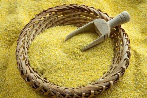 Corn flour or corn meal, a healthy powder used to make polenta and tortillas. Stock Photos