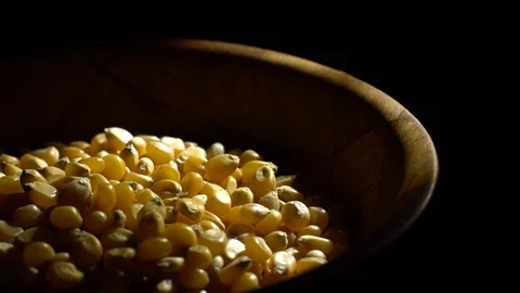 Corn grains in a bowl. Sweet maize, cereal grains. Rotation. Black background. Stock Footage 101484726