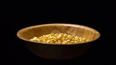 Corn grains in a bowl. Sweet maize, cereal grains. Rotation. Black background. Stock Footage 101484754