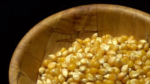 Corn grains in a bowl. Sweet maize, cereal grains. Rotation. Black background. Stock Footage 101485020