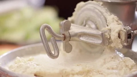 Corn grinding process for the preparation of the humitas. Stock Footage 221214499