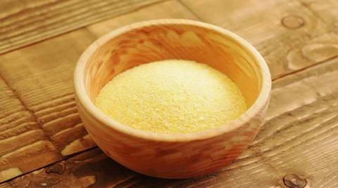 Corn Grits - corn Flour; pouring; close up;  Stock Footage 35924246
