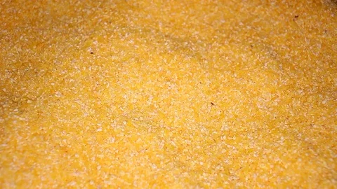 Corn grits grains rotating seamless looping food texture pattern close up Stock Footage 103084427