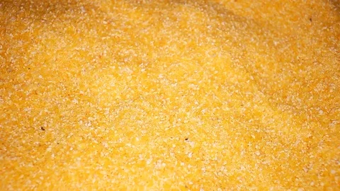 Corn grits grains rotating seamless looping food texture pattern close up Stock Footage 103093875