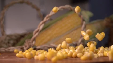 Corn maize falling on the wood. Slow motion 240 fps. Shot on sony rx 10 Vídeos de archivo 97905297